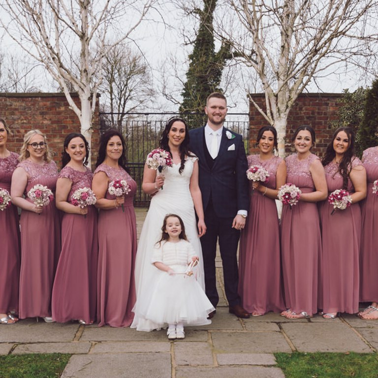 Bridal party wedding portrait outside Lion Quays in Oswestry 