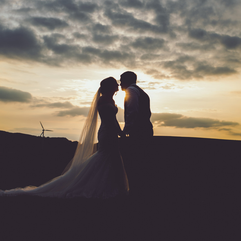 Sunset silhouette of Bride & Groom during wedding photography at North Wales wedding