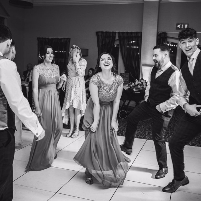 Bridesmaids and Groomsmen dance at wedding, Lion Quays Oswestry 