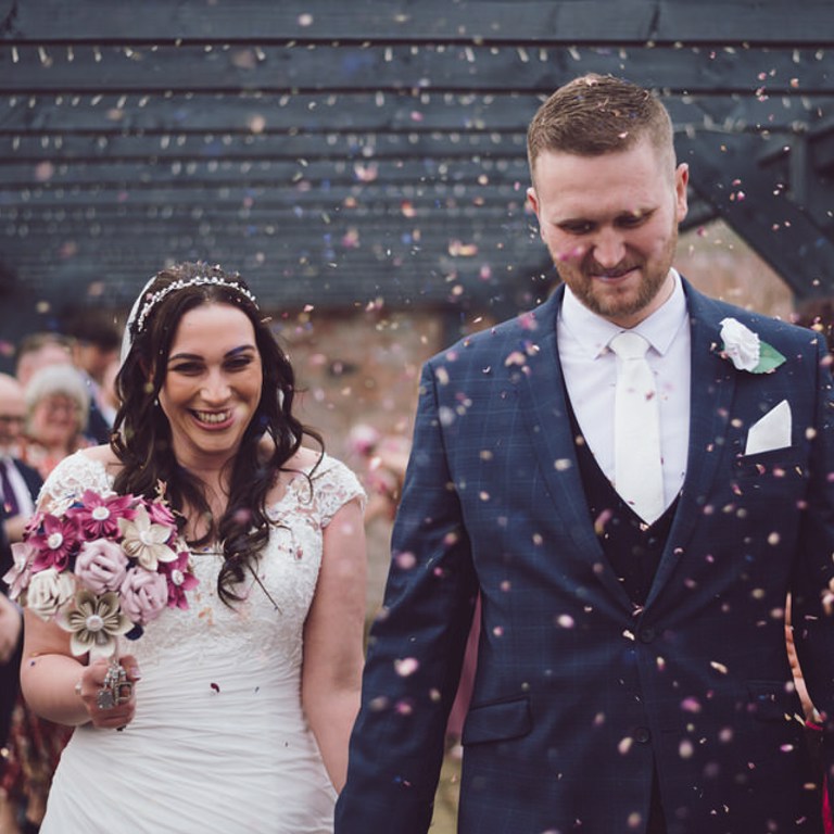 Bride & Groom confetti shot after wedding at Lion Quays Oswestry
