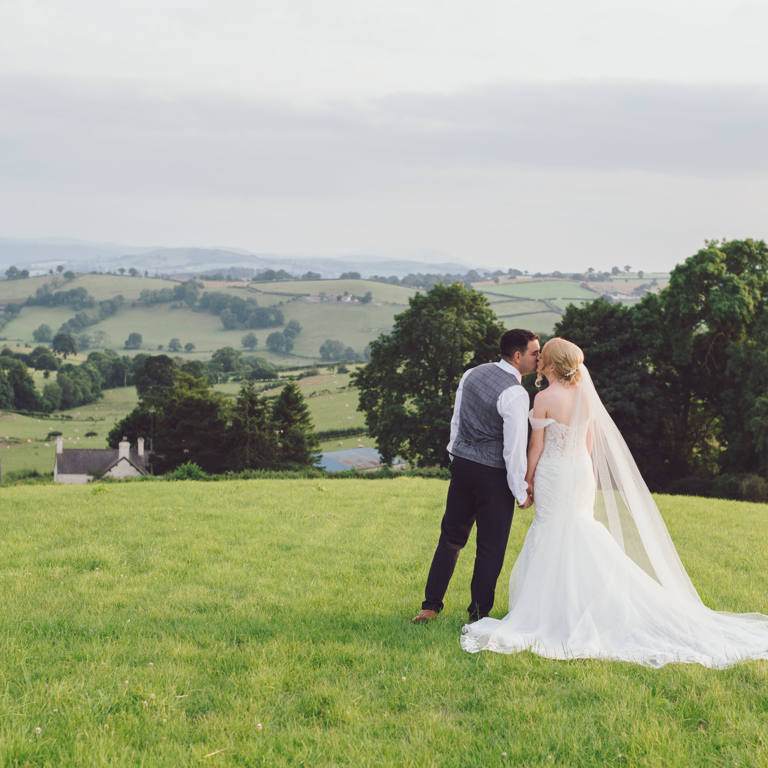 Bride & Groom overlooking North Wales on wedding day