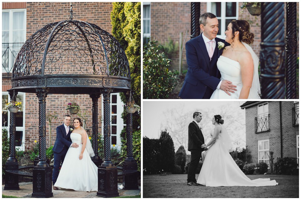 Bride & Groom pose for photographs in the grounds at at Rossett Hall Hotel