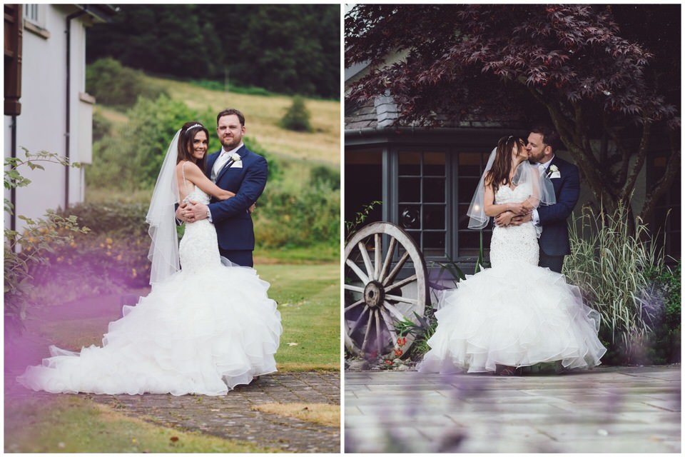 Bride & Groom pose for wedding day portraits outside of the Wild Pheasant Hotel