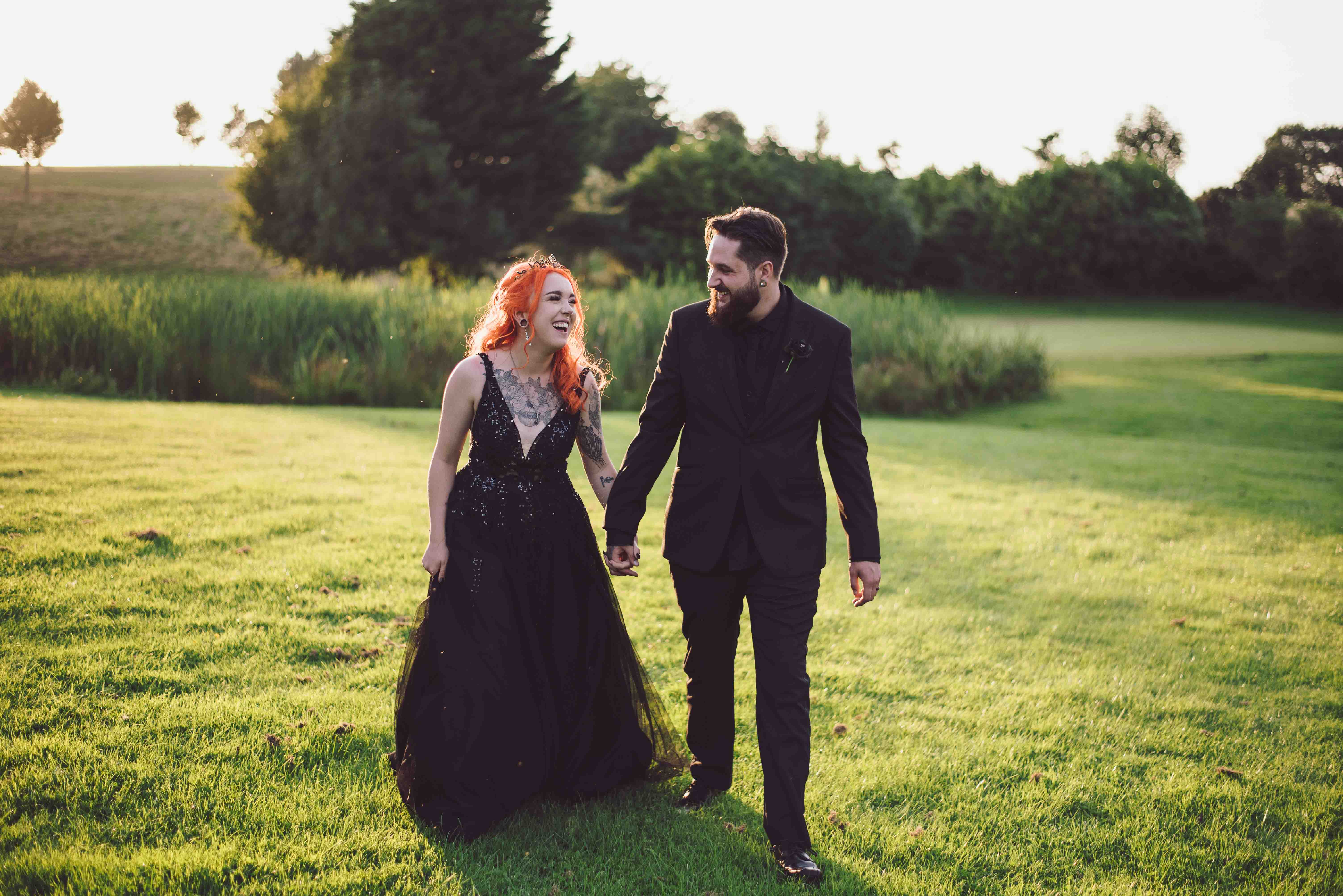 Bride & Groom dressed all in black at wedding in Flint Mountain, North Wales