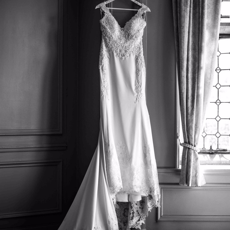 Bridal prep wedding dress hanging up at Thornton Manor Wirral