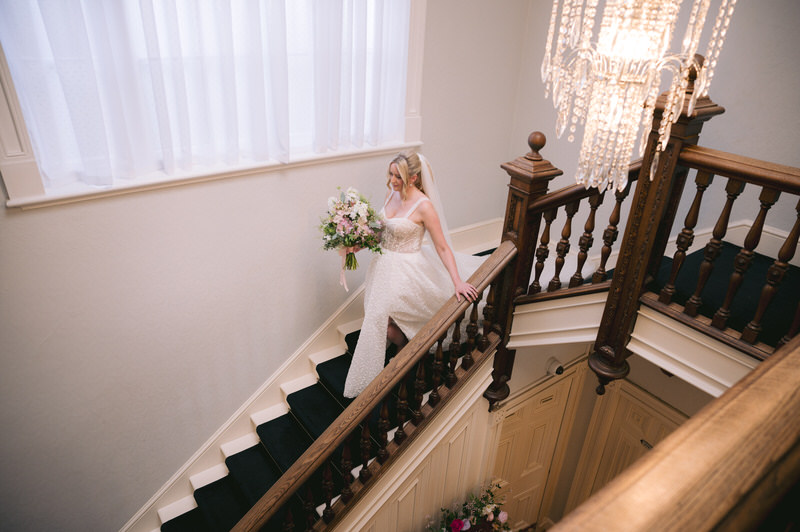 Wedding breakfast room at Highfield Hall dressed in blush pink and florals