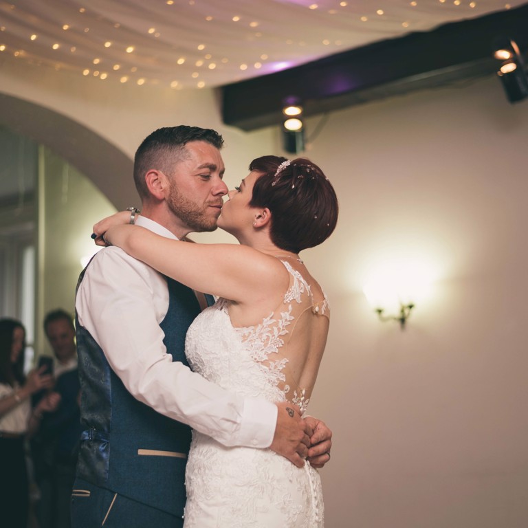 Bride and Groom wedding first dance kiss at Highfield Hall Northop