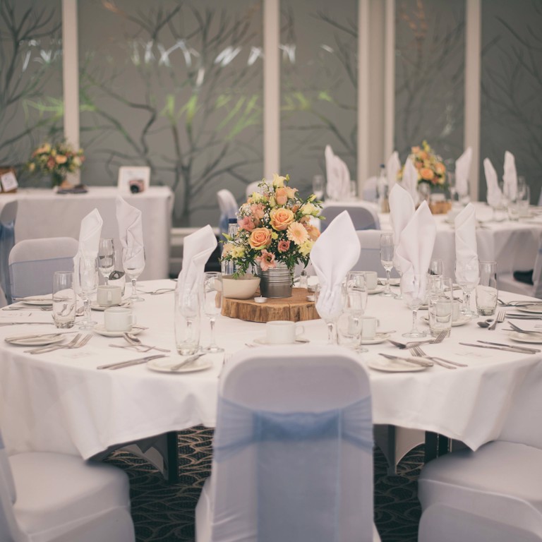 Wedding reception room set up for a wedding at Lion Quays Hotel