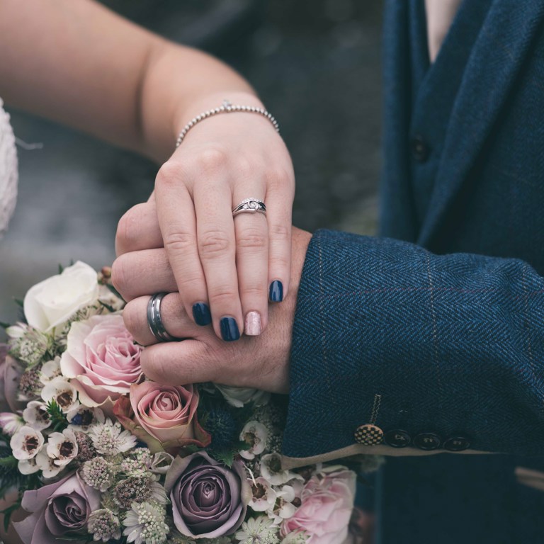 Bride and Groom Wedding ring photography at Highfield Hall Northop