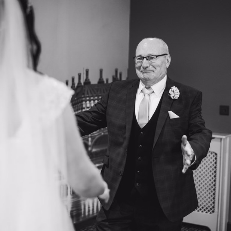 Father emotional when he sees daughter in wedding dress at Lion Quays