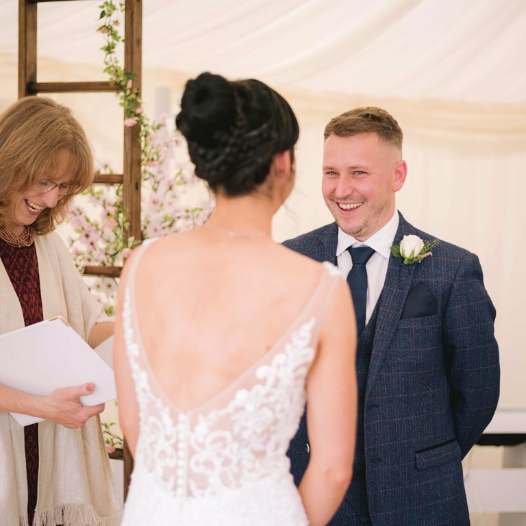 Bride and Groom ceremony at Marquee wedding in Penyffordd North Wales