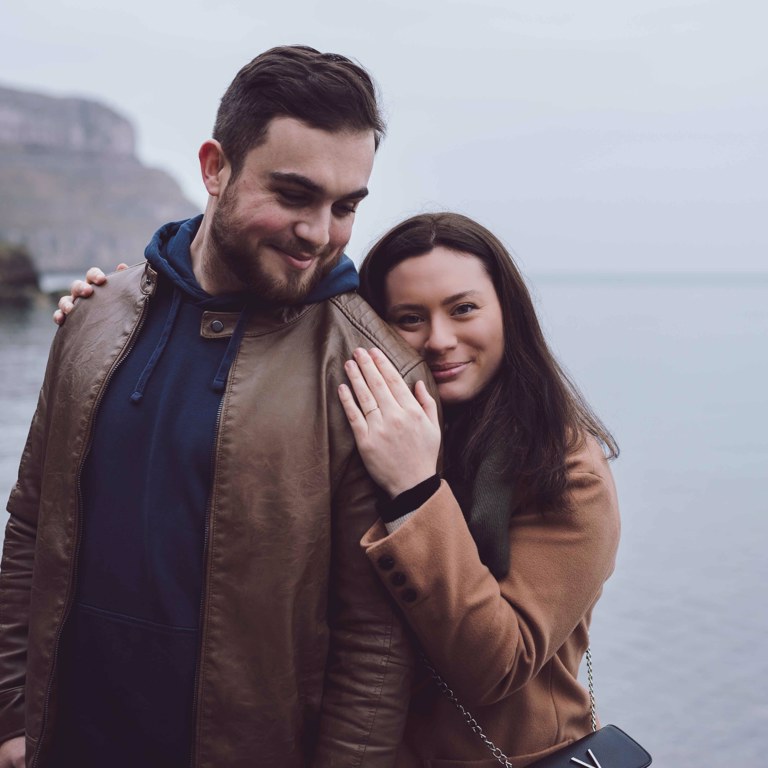 Engaged couple pose during pre-wedding photoshoot