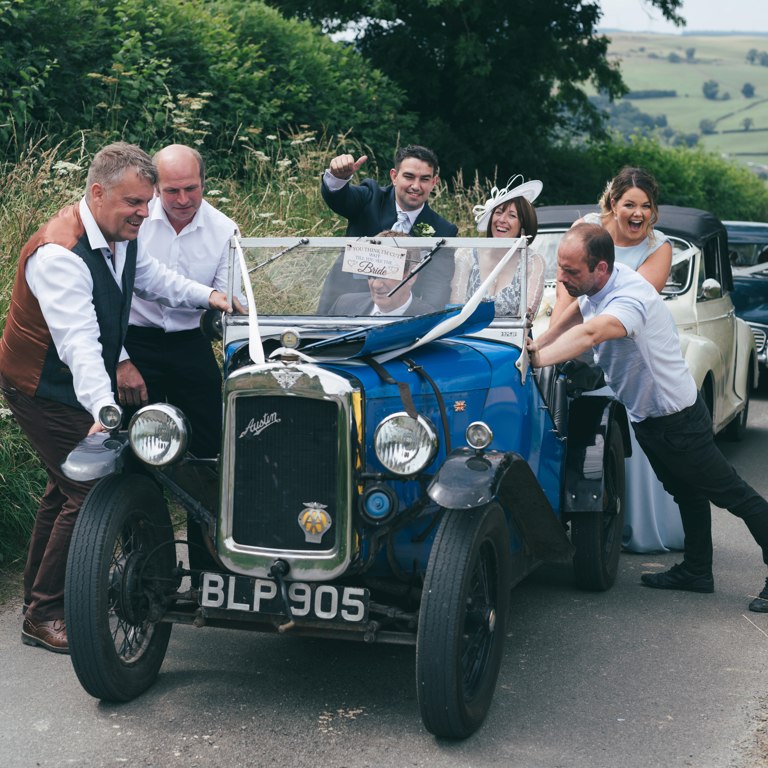 Grooms wedding car breaks down on way to wedding reception