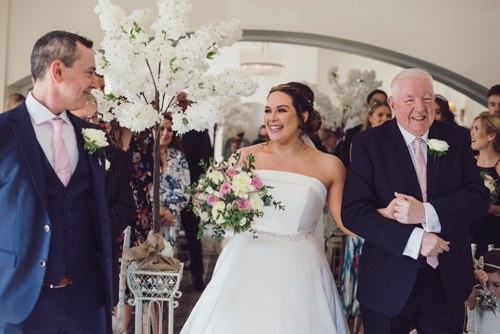 Father walks bride down the aisle in Rossett Hall Hotel